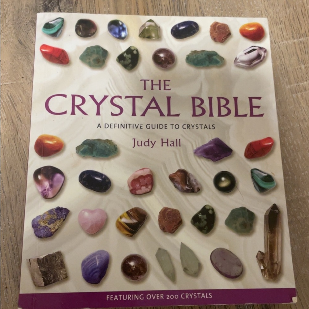 The Crystal Bible by Judy Hall - Illustrated Crystal Guide (White/Purple)